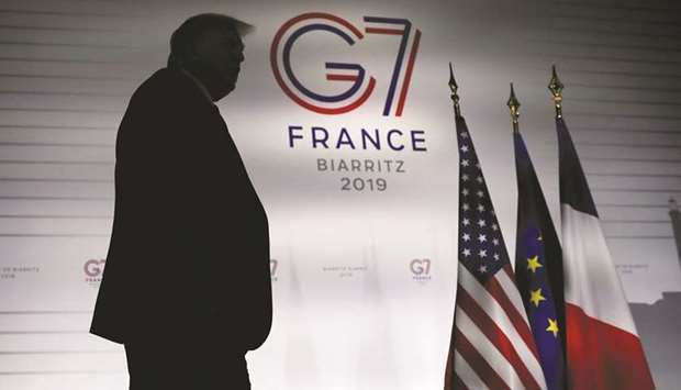 US President Donald Trump arrives to a news conference at the end of the G7 summit in Biarritz, France on Monday. Trump left the G-7 summit on Monday taking a softer tone toward China, just days after spooking financial markets with another escalation in their trade war. Yet amid all the soothing words, Trump made it clear that he wasnu2019t abandoning his rough and tumble tactics to force a trade deal on China.