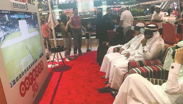 Football fans trying out the latest technology rolled out by Ooredoo Qatar and Ericsson.
