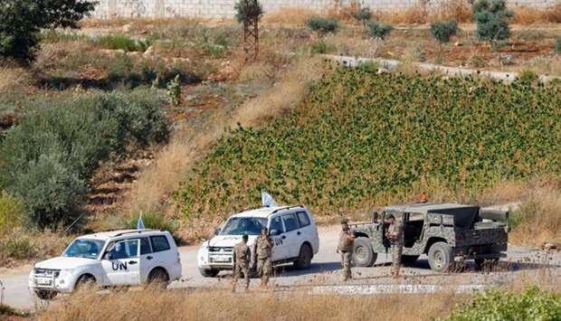 Lebanese army and United Nations Interim Forces in Lebanon (UNIFIL) vehicles patrolling in the Lebanese village of Aitaroun along the the Israeli side of the border with Lebanon