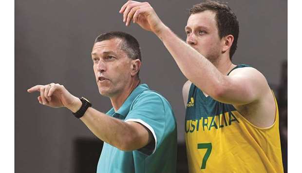 This file photo taken on August 19, 2016, shows Australiau2019s head coach Andrej Lemanis (left) and Australiau2019s small forward Joe Ingles gesturing during their 2016 Olympic Games semi-final against Serbia in Rio de Janeiro. (AFP)