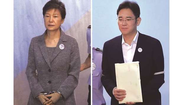 South Koreau2019s ousted leader Park Geun-hye (left) and Samsung Group heir Lee Jae-yong.