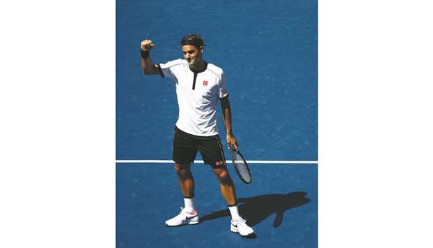 Roger Federer of Switzerland celebrates his win over Daniel Evans of Great Britain on day five of the US Open at the USTA Billie Jean King National Tennis Center in New York yesterday.