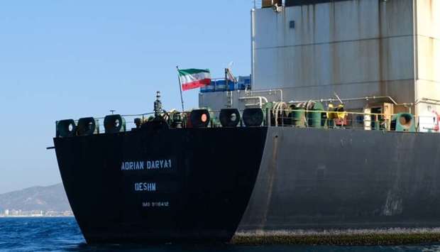 In this file photo taken on August 18, an Iranian flag flutters on board the Adrian Darya oil tanker, formerly known as Grace 1, off the coast of Gibraltar.