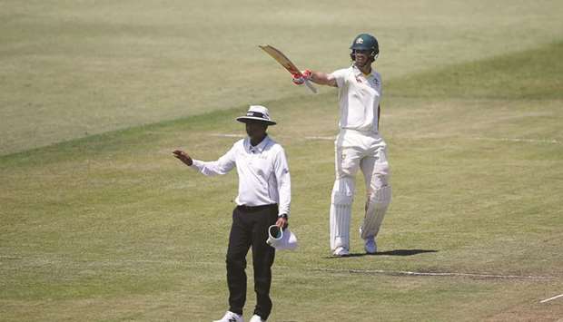 In this March 2, 2018, picture, Australiau2019s Mitchell Marsh (right) celebrates a half-century during a Test match against South Africa in Durban. (AFP)