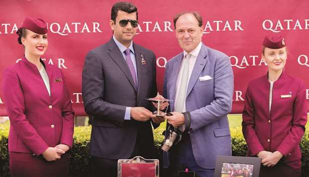 Hamad bin Abdurahman al-Attiyah (second from left), president of Qatar and Asian equestrian federations and QREC vice-chairman, presented the trophies for Qatar Lilie Langtry Stakes (Group 2) after Enbihaar won the race at the Qatar Goodwood Festival yesterday. PICTURES: Juhaim & Zuzanna Lupa