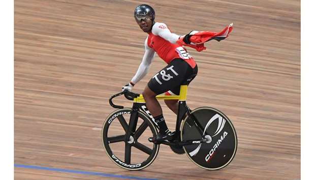 Trinidad and Tobagou2019s Nicholas Paul celebrates after winning the menu2019s sprint gold at the track cycling competition during the Pan-American Games in Lima. (AFP)