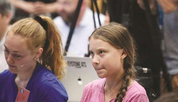 Thunberg is seen at the opening press conference of the u2018Smile for Future Summit for Climateu2019 event in Lausanne.
