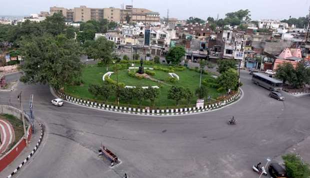 A deserted intersection is pictured in Jammu.