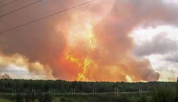 A screen grab from a video made yesterday that shows explosions at an ammunition depot near the town of Achinsk in the Krasnoyarsk region