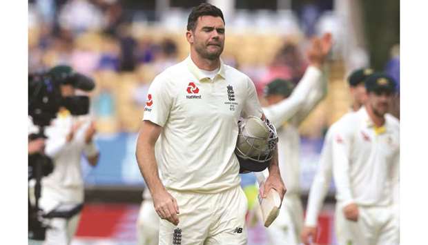 Englandu2019s James Anderson walks from the field after England are bowled out on the fifth day of the first Ashes Test at Edgbaston in Birmingham, central England, on Monday. (AFP)