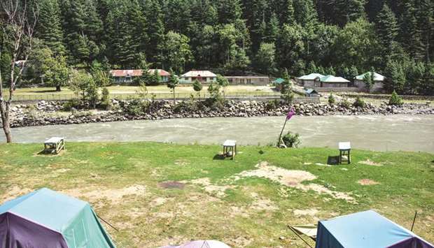 This picture taken yesterday shows a deserted tourist site along a river in Neelum Valley, near the Line of Control.