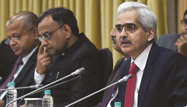 Reserve Bank of India governor Shaktikanta Das (right) speaks during a press conference at RBI headquarters in Mumbai. Indiau2019s central bank cut interest rates for the fourth time this year yesterday as New Delhi battles sluggish economic growth and high unemployment.