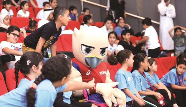 Falah the Falcon mascot interacting with students at the Summer with Tarsheed camp.
