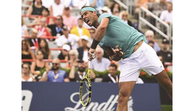 Rafael Nadal of Spain serves against Daniel Evans (not pictured) of Great Britain on sixth day of the Rogers Cup in Montreal, Canada, on Wednesday. (AFP)