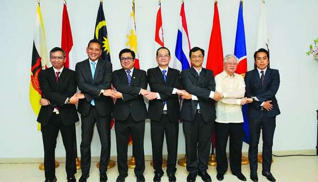 ACD representatives link hands as they meet to mark the Association of South East Asian Nations Day