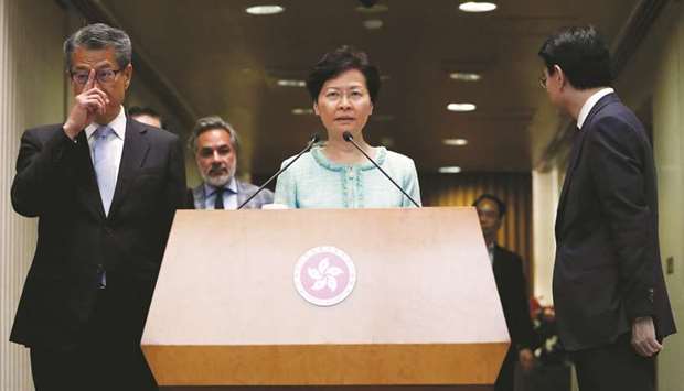 Hong Kong chief executive Carrie Lam attends a news conference. u201cWe have had two months of political dispute. This is not a cyclical downturn. Moreover, this downturn is  coming very quickly. Some people have described it as coming like a tsunami...the economic recovery will take a long time,u201d she said.