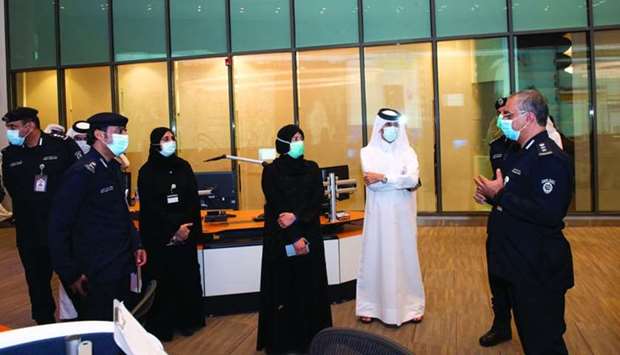 HE the Minister of Public Health and Chair of the National Covid-19 Committee Dr Hanan Mohamed al-Kuwari with officials at the NCC.