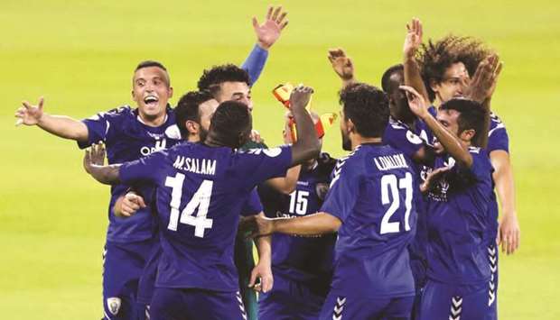 Al Kharaitiyat players celebrate after their promotion to QNB Stars League.