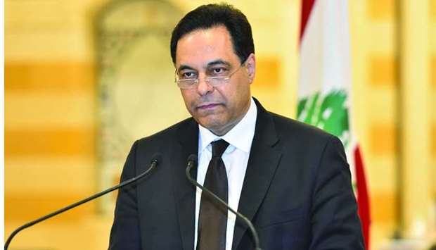 Prime Minister Diab announcing his government's resignation