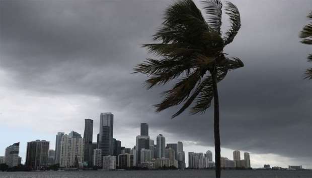 Storm clouds are seen over the city as Hurricane Isaias approaches the east coast of Florida