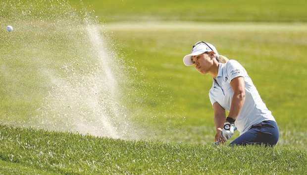 Danielle Kang plays a shot from a bunker on the second hole during the first round of the LPGA Drive On Championship at Inverness Club in Toledo, Ohio, on Friday. (Getty Images/AFP)