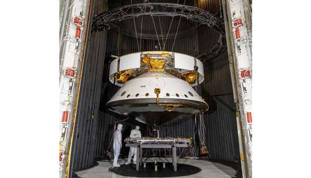 PREP: Engineers prepare the Mars 2020 spacecraft for a thermal vacuum test on May 9, 2019 in the Space Simulator Facility at Nasau2019s Jet Propulsion Laboratory in Pasadena, California.