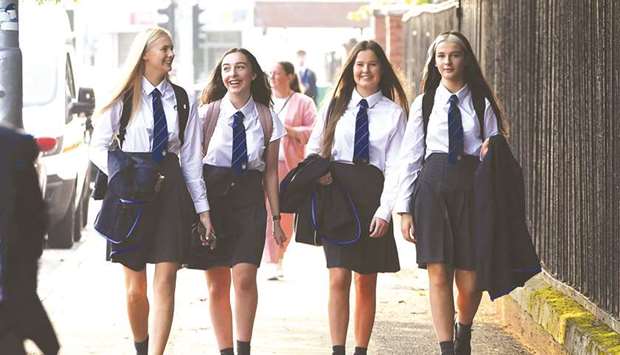 Pupils return to Holyrood Secondary School in Glasgow yesterday for the first time following the easing of coronavirus lockdown measures.