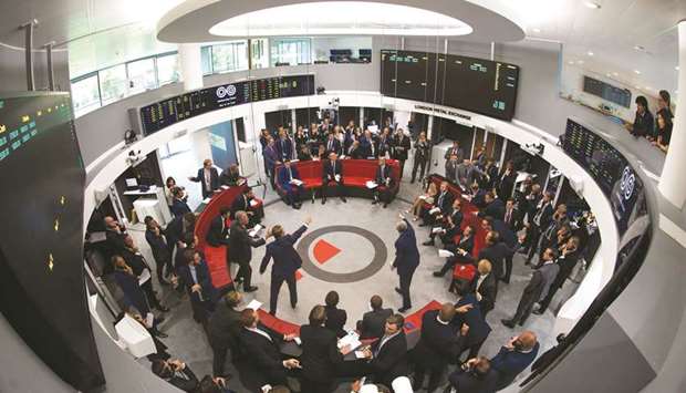Traders react on the trading floor of the open outcry pit at the London Metal Exchange (file).