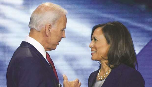Former US vice-president Joe Biden and Senator Kamala Harris speak on September 12, 2019, in Houston, Texas, after the third Democratic primary debate of the 2020 presidential campaign season hosted by ABC News in partnership with Univision at Texas Southern University in Houston, Texas. Biden named Harris, a high-profile black senator from California, as his vice presidential choice on August 11, 2020, capping a months-long search for a Democratic partner to challenge President Donald Trump in November.