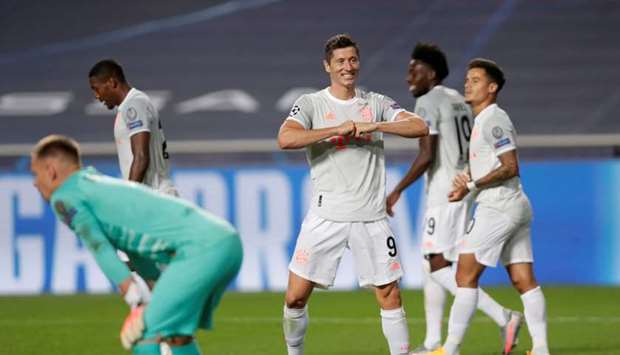 Bayern Munich's Robert Lewandowski celebrates scoring their sixth goal, as play resumes behind closed doors following the outbreak of the coronavirus disease Manu Fernandez
