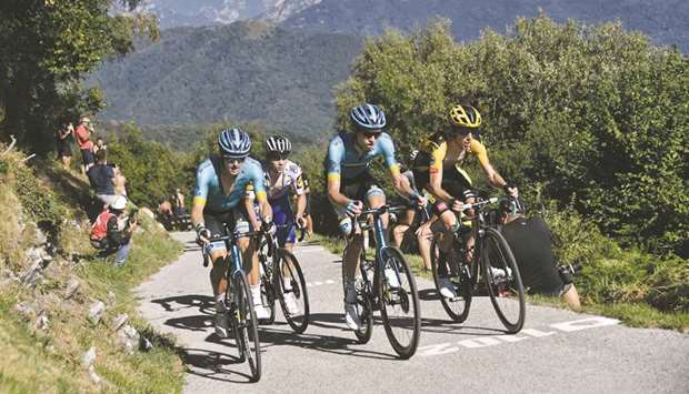 Astana Pro Team Denmark rider Jakob Fuglsang (left) rides during the 114th edition of the giro di Lombardia (Tour of Lombardy), a 231km cycling race from Bergamo to Como, Italy, yesterday. (AFP)