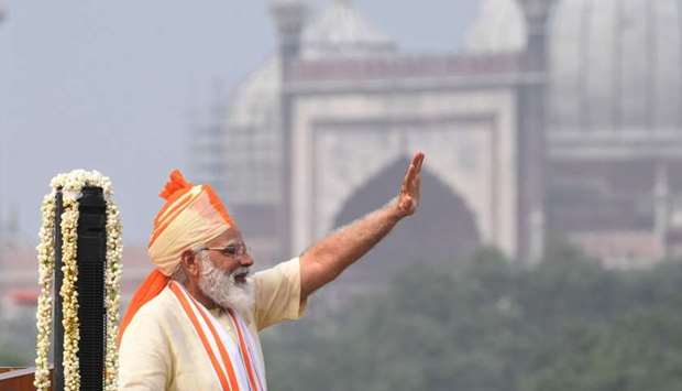 India's Prime Minister Narendra Modi waves after his speech to the nation during a ceremony to celebrate India's 74th Independence Day, which marks the of the end of British colonial rule, at the Red Fort in New Delhi