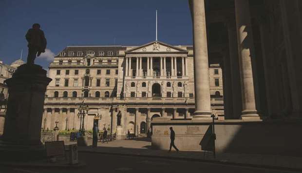 The Bank of England building in the City of London. The UK bond market is flashing warning signals to BoE Governor Andrew Bailey ahead of the central banku2019s meeting this week. While traders donu2019t expect the BoE to alter monetary policy on Thursday, bets on easier funding conditions are building.