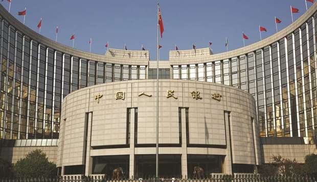 The Peopleu2019s Bank of China headquarters in Beijing. The PBoC can still dictate where it wants the yuan to trade with its daily fix. Based on quotes submitted by 14 banks every morning, the rate restricts the onshore yuanu2019s moves by 2% on either side.