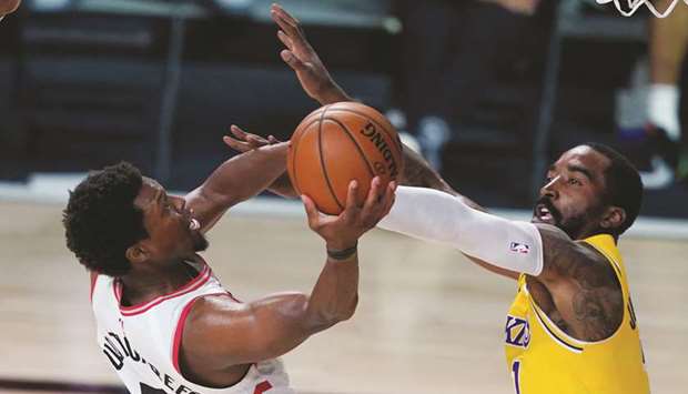 Toronto Raptors guard Kyle Lowry (L) shoots the ball against Los Angeles Lakers guard JR Smith during the second half at The Arena. PICTURE: Ashley Landis/Pool Photo via USA TODAY Sports