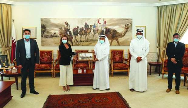 Ali bin Hassan al-Hammadi and Farah Berri with other officials.rnrn