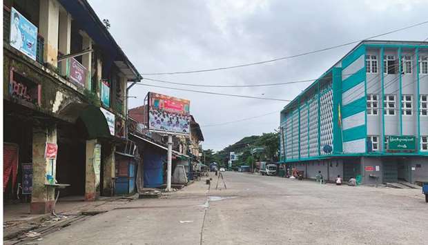 A deserted main street is pictured yesterday during a lockdown amidst fears of the coronavirus in Sittwe, capital of Rakhine state in southern Myanmar.