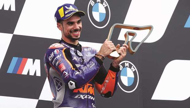 Red Bull KTM Tech 3u2019s Miguel Oliveira celebrates his Styrian MotoGP Grand Prix win on the podium at the Red Bull Ring in Spielberg, Austria, yesterday. (Reuters)