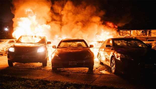 Cars are set on fire in Kenosha, Wisconsin.