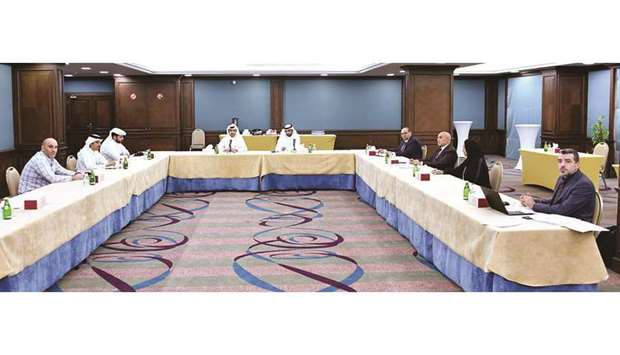 Qatar Chamber general manager Saleh bin Hamad al-Sharqi presides over the meeting yesterday.
