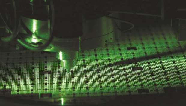 A machine places single solder balls onto a printed circuit board (PCB) during manufacture at the Infineon Technologies microchip and sensor facility in Regensburg, Germany. European semiconductor makers donu2019t rely heavily on US knowhow for the chips they supply to Huawei Technologies. They could still take a hit from Washingtonu2019s tightening restrictions on the Chinese company.