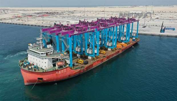 The ship was loaded with rubber-tyred gantry cranes for vertical container transportation.