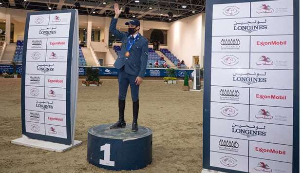 Hamad Nasser al-Qadi celebrates with the Big Tour winneru2019s medal after third season of the Longines Hathab u2014 Qatar Equestrian Tour concluded yesterday.