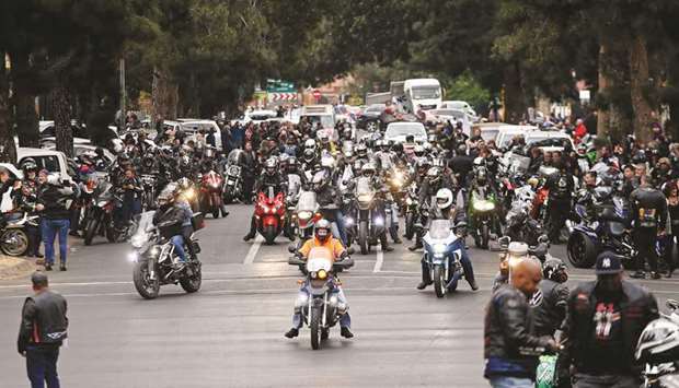 Bikers United Against Farm Murders and Racism ride towards the Union Buildings in Pretoria, yesterday to protest against farm murder and racism. Thousands of bikers from all over South Africa gathered around the capital city to deliver white roses and black or white crosses attached with letters written to South African President to stop farm murders and racism.
