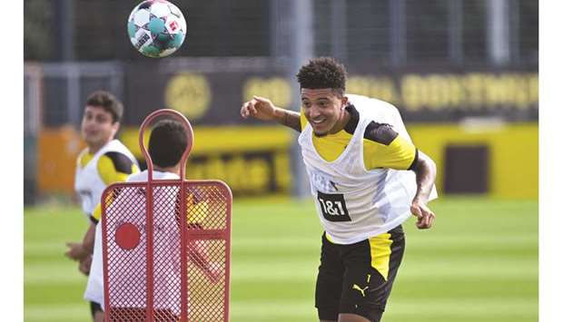 Borussia Dortmundu2019s Jadon Sancho trains in Dortmund, western Germany, on Monday. (AFP)
