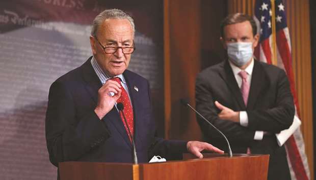 US Senate Minority Leader Chuck Schumer, Democrat of New York, speaks to the press yesterday, at the US Capitol in Washington, DC.