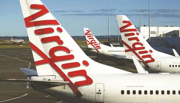 Virgin Australia will cut a third of its workforce and scale back its fleet under the ownership of Bain Capital as the buyout firm attempts to resurrect the airline during the industryu2019s worst-ever crisis