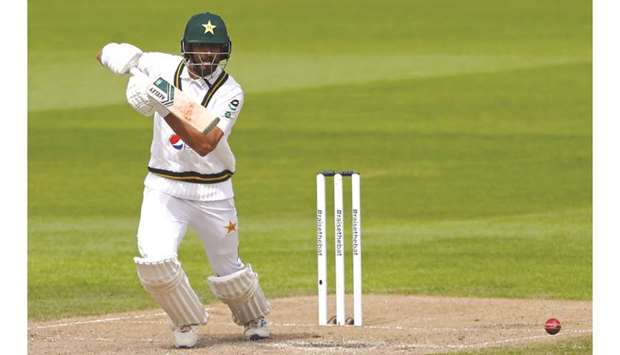 Pakistanu2019s Shan Masood plays a shot during the second day of the first Test against  England in Manchester yesterday. (AFP)