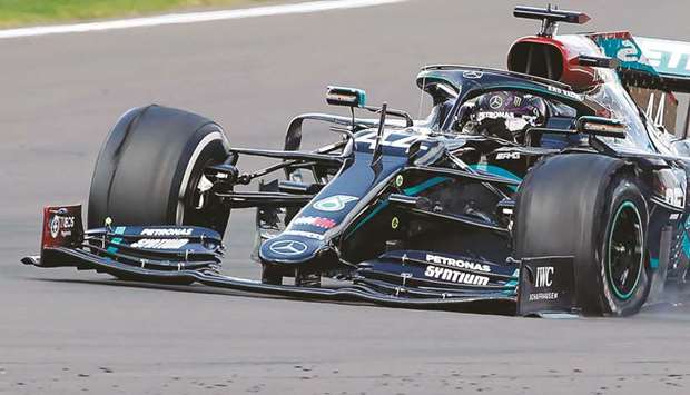 The punctured tyre of Mercedesu2019 driver Lewis Hamilton is pictured as he goes on to win the British Grand Prix at the Silverstone circuit on Sunday. (AFP)