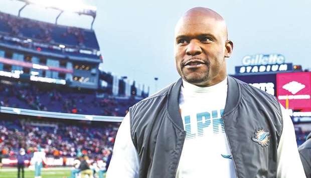 Head coach Brian Flores of the Miami Dolphins exits the field after a win over the New England Patriots at Gillette Stadium on December 29, 2019, in Foxborough, Massachusetts. (Getty Images/TNS)